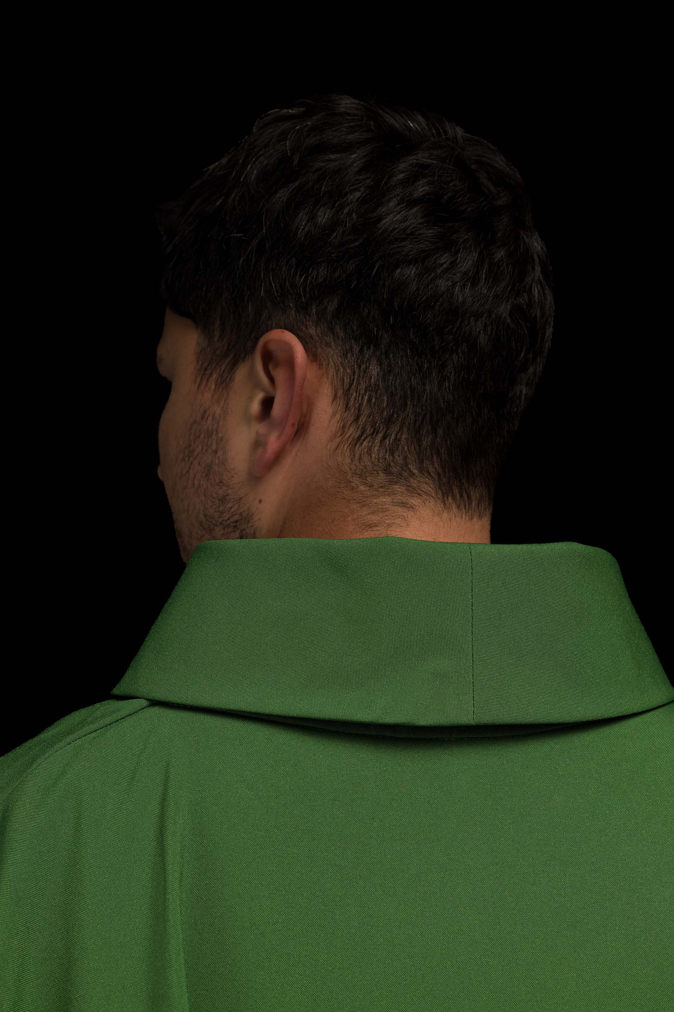 Casula Verde ricamata con motivo dorato IHS