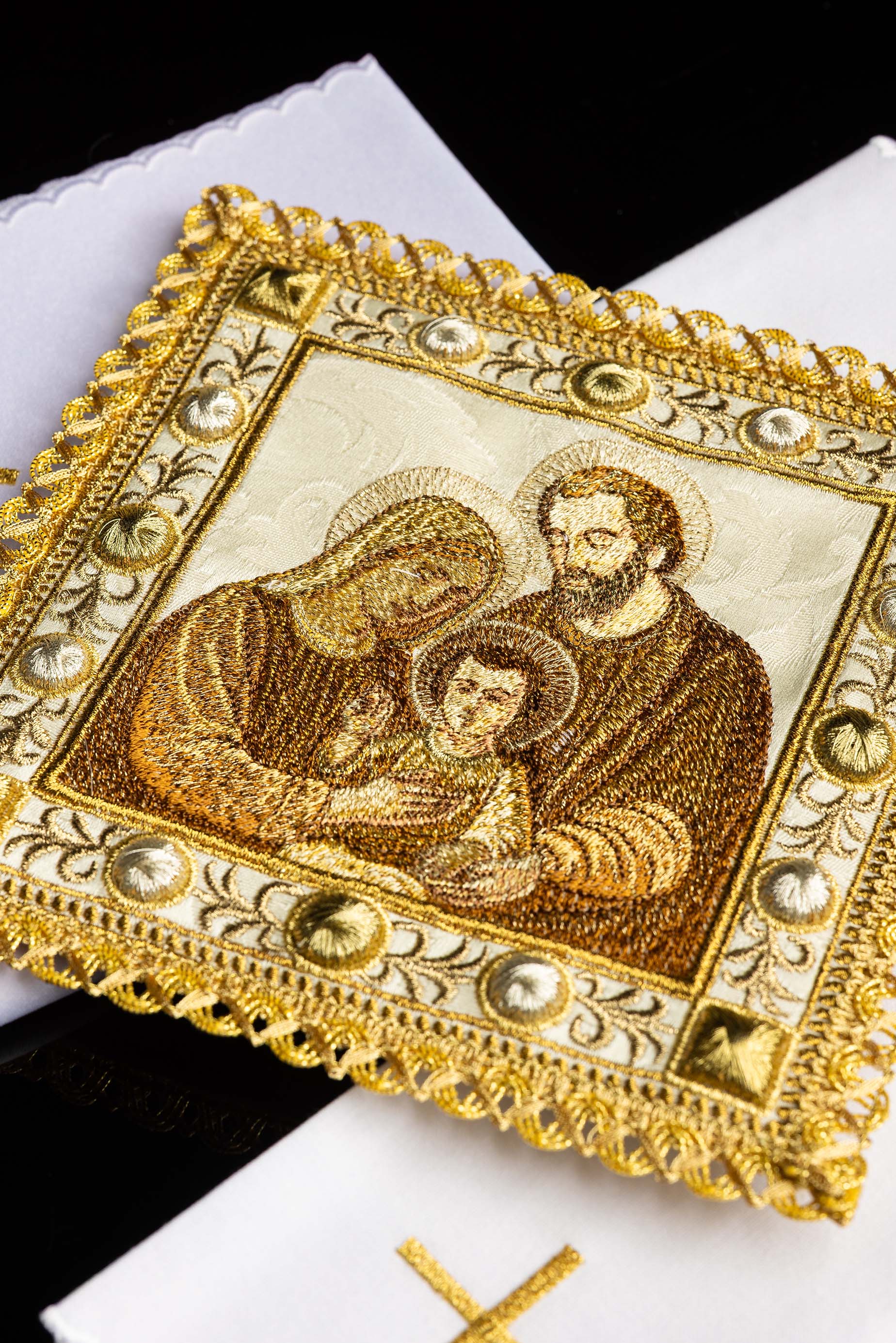 Servizio da messa di Natale con l’immagine della Sacra Famiglia